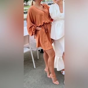 Flowy rust linen mini dress with bow details